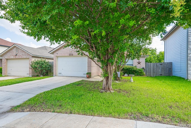 11002 Stagwood Pass, San Antonio, TX 78254 - view of front facade with brick siding, driveway, and an attached garage
