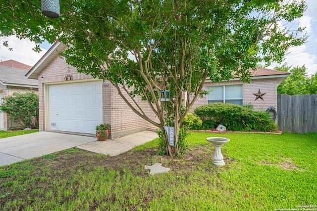 11002 Stagwood Pass, San Antonio, TX 78254 - obstructed view of property featuring brick siding and concrete driveway