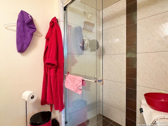 7039 San Pedro Ave Unit 601, San Antonio, TX 78216 - bathroom featuring a shower stall and a sink
