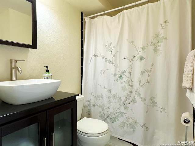 7039 San Pedro Ave Unit 601, San Antonio, TX 78216 - bathroom featuring vanity and a shower with shower curtain