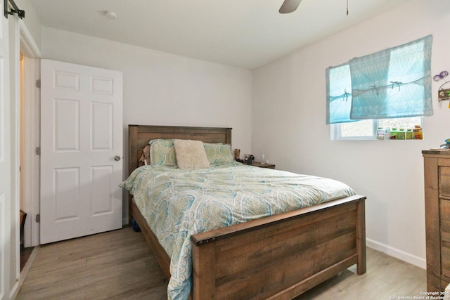 802 Poinsettia, San Antonio, TX 78202 - bedroom featuring wood finished floors and a ceiling fan