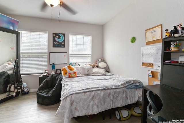 802 Poinsettia, San Antonio, TX 78202 - bedroom with wood finished floors and ceiling fan