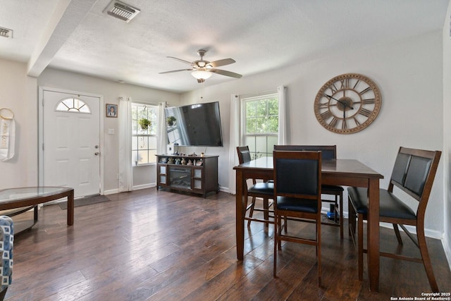 802 Poinsettia, San Antonio, TX 78202 - dining area featuring ceiling fan, dark wood-type flooring, and a textured ceiling