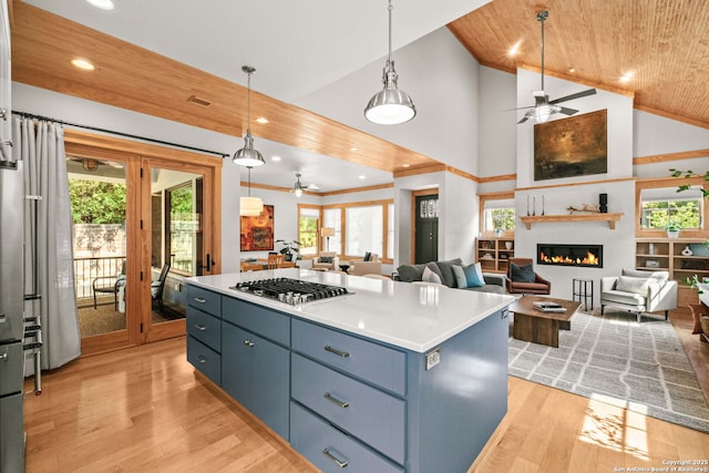 217 Alta, San Antonio, TX 78209 - kitchen with ceiling fan, stainless steel gas cooktop, open floor plan, light wood-style flooring, and plenty of natural light