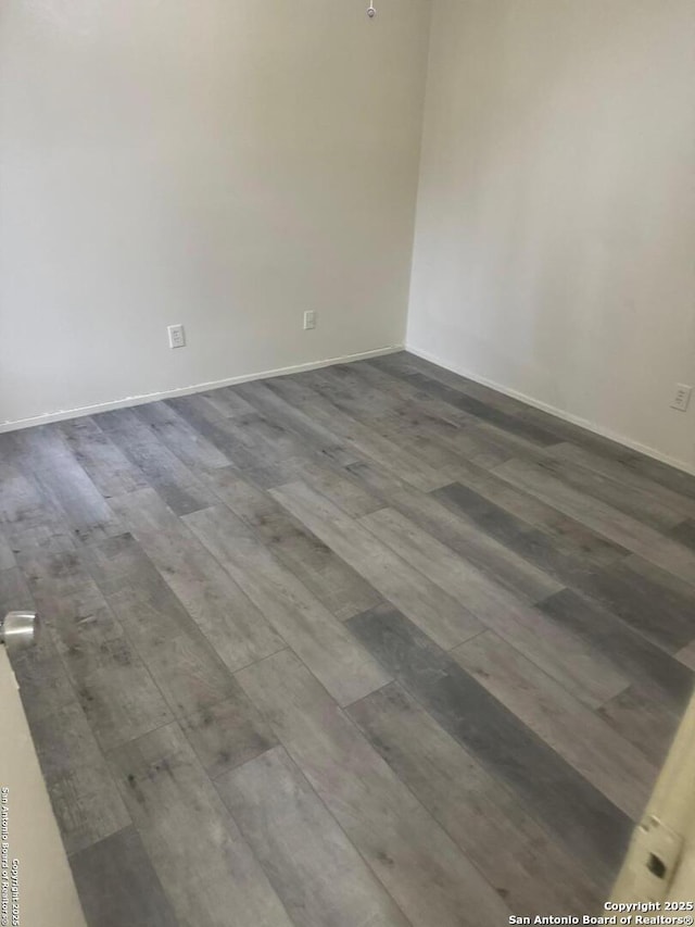 13136 Los Espanada, San Antonio, TX 78233 - unfurnished room featuring dark wood-style floors