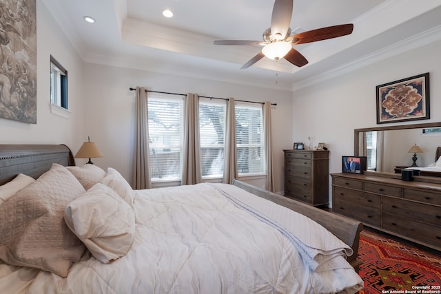 26130 Sunny Mdw, San Antonio, TX 78260 - bedroom with a tray ceiling, recessed lighting, wood finished floors, ceiling fan, and ornamental molding