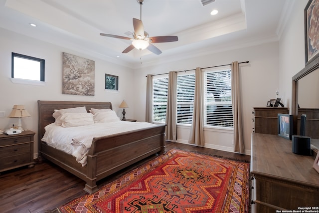 26130 Sunny Mdw, San Antonio, TX 78260 - bedroom featuring dark wood-type flooring, ornamental molding, recessed lighting, ceiling fan, and a tray ceiling