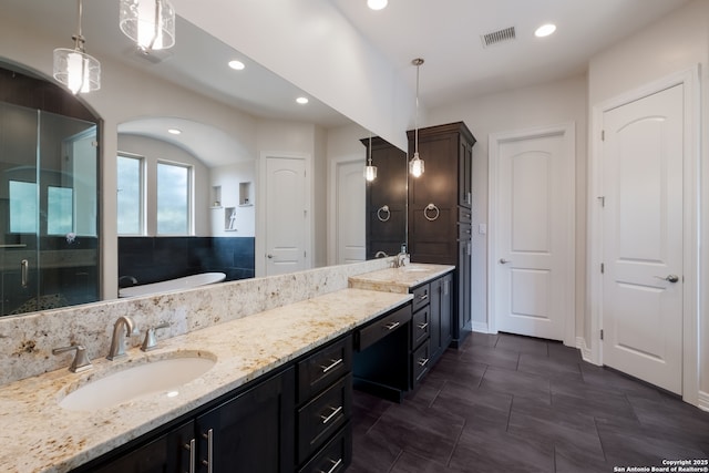 26130 Sunny Mdw, San Antonio, TX 78260 - full bath featuring a freestanding bath, double vanity, recessed lighting, and a shower stall
