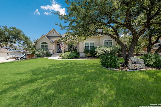 26130 Sunny Mdw, San Antonio, TX 78260 - obstructed view of property featuring a front yard and stucco siding