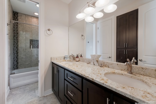 26130 Sunny Mdw, San Antonio, TX 78260 - bathroom featuring double vanity and enclosed tub / shower combo