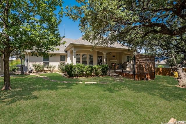 26130 Sunny Mdw, San Antonio, TX 78260 - rear view of house with stucco siding and a shingled roof