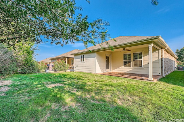 13059 Cache, San Antonio, TX 78253 - back of house with ceiling fan and a yard