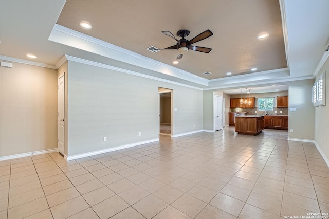 13059 Cache, San Antonio, TX 78253 - unfurnished living room featuring a tray ceiling, a ceiling fan, light tile patterned flooring, recessed lighting, and crown molding
