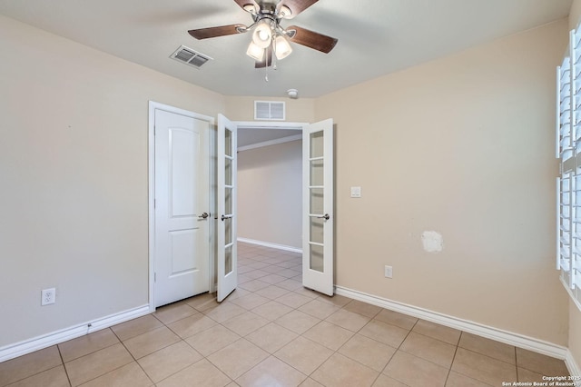13059 Cache, San Antonio, TX 78253 - unfurnished bedroom with french doors, light tile patterned floors, and ceiling fan