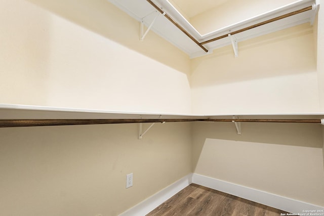 302 Riley Way, Kerrville, TX 78028 - spacious closet featuring dark wood-style flooring