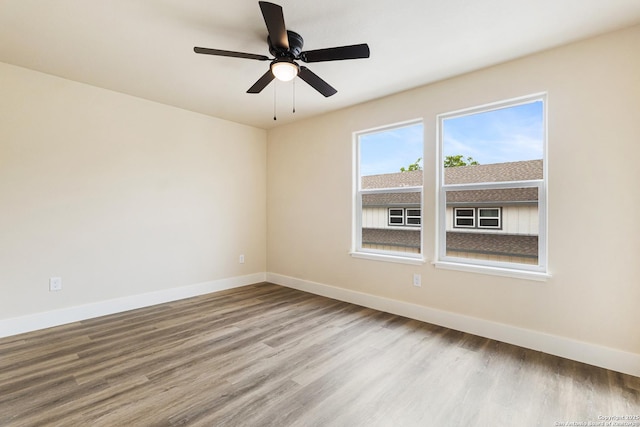 302 Riley Way, Kerrville, TX 78028 - unfurnished room with wood finished floors and a ceiling fan