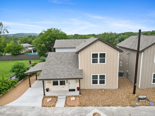 302 Riley Way, Kerrville, TX 78028 - view of front of property featuring a shingled roof, driveway, and board and batten siding