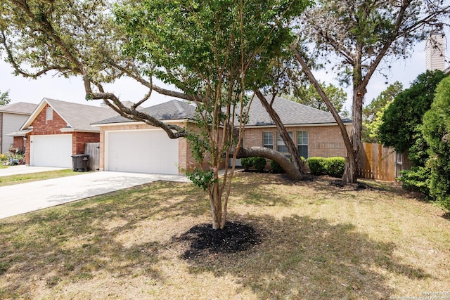 10511 Stone Crk, San Antonio, TX 78254 - view of front of house with brick siding, driveway, an attached garage, and roof with shingles