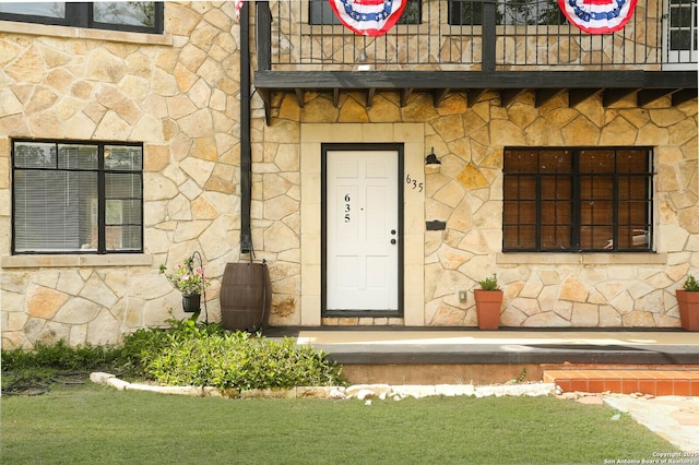 1002 Kampmann Blvd, San Antonio, TX 78201 - entrance to property with stone siding and a balcony