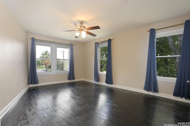 1002 Kampmann Blvd, San Antonio, TX 78201 - unfurnished room featuring ceiling fan and dark wood-type flooring
