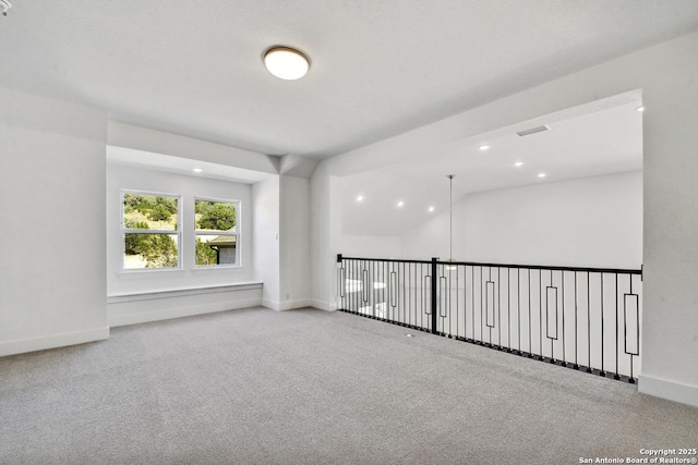 228 Dulce Vis, Boerne, TX 78006 - empty room with carpet, recessed lighting, and lofted ceiling