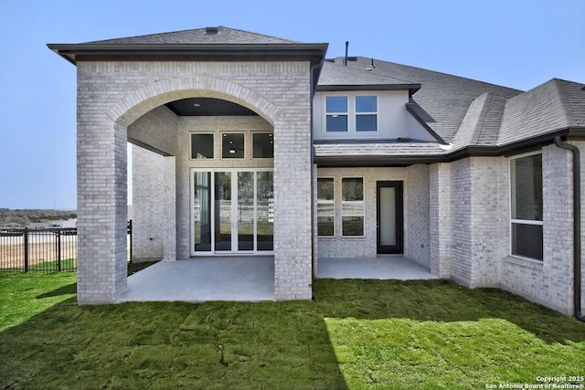 228 Dulce Vis, Boerne, TX 78006 - rear view of house featuring a patio and brick siding
