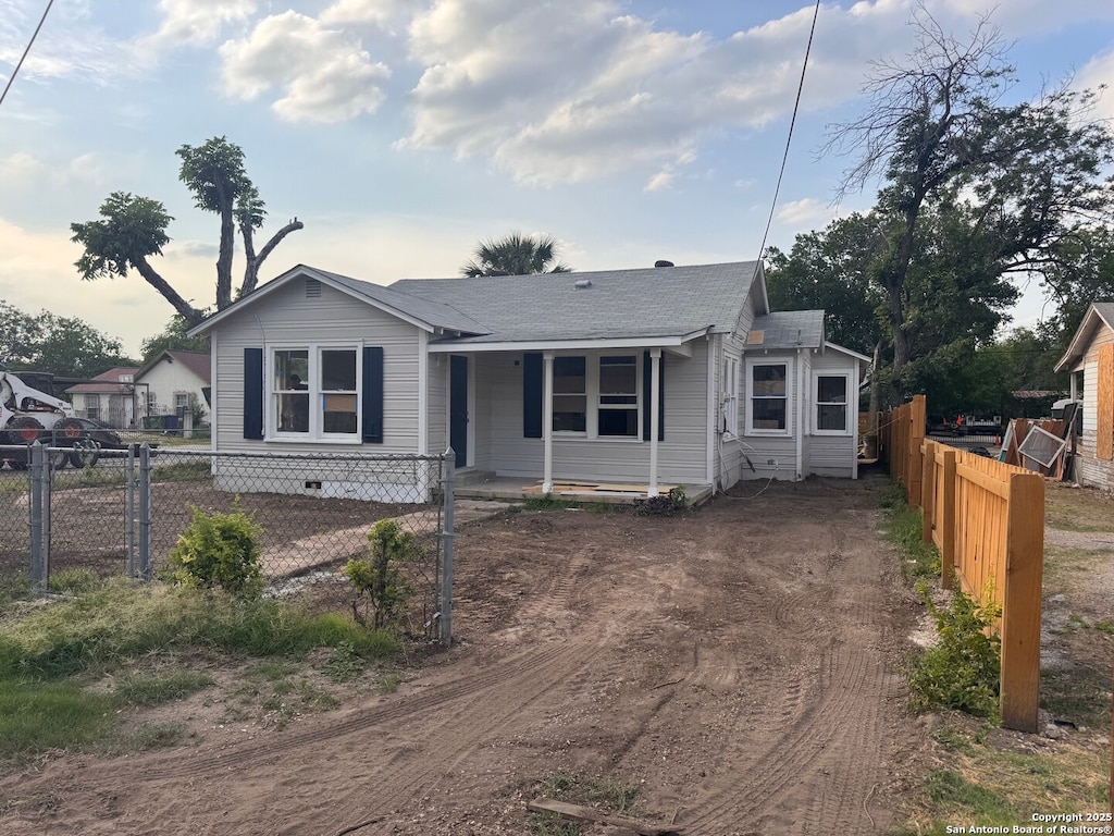 1203 Denver, San Antonio, TX 78210 - bungalow featuring a shingled roof and dirt driveway