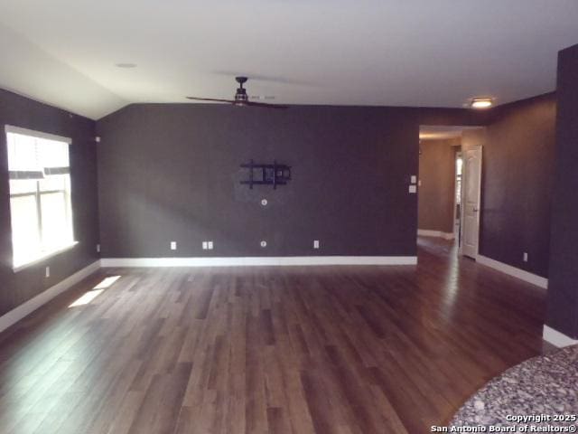 2690 Mccrae, New Braunfels, TX 78130 - unfurnished living room with ceiling fan, wood finished floors, and lofted ceiling