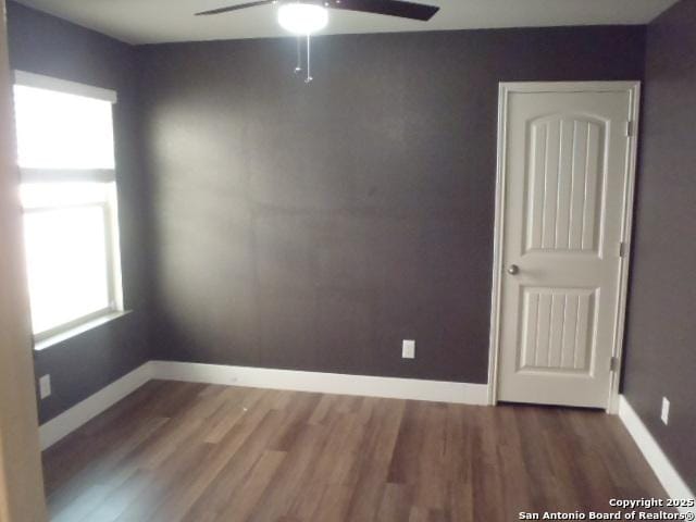 2690 Mccrae, New Braunfels, TX 78130 - empty room featuring a ceiling fan and wood finished floors