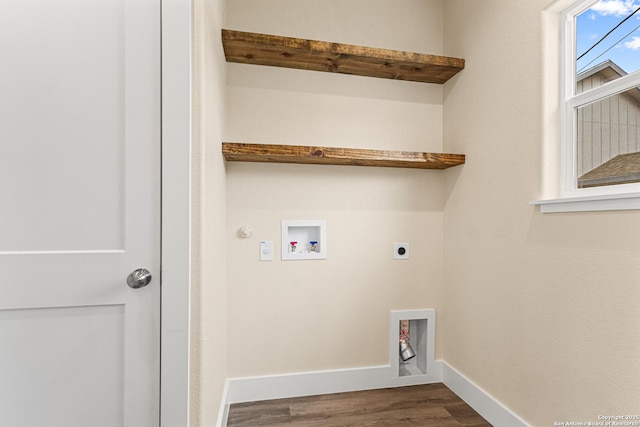 304 Riley Way, Kerrville, TX 78028 - laundry room featuring hookup for an electric dryer, dark wood-type flooring, hookup for a washing machine, and hookup for a gas dryer