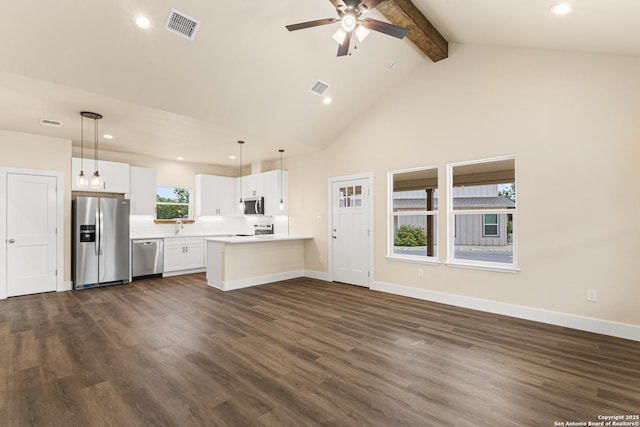 304 Riley Way, Kerrville, TX 78028 - unfurnished living room with beam ceiling, dark wood-type flooring, a ceiling fan, recessed lighting, and high vaulted ceiling