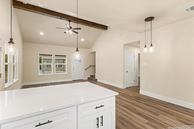 304 Riley Way, Kerrville, TX 78028 - kitchen featuring dark wood-style flooring, a ceiling fan, white cabinets, beam ceiling, and open floor plan
