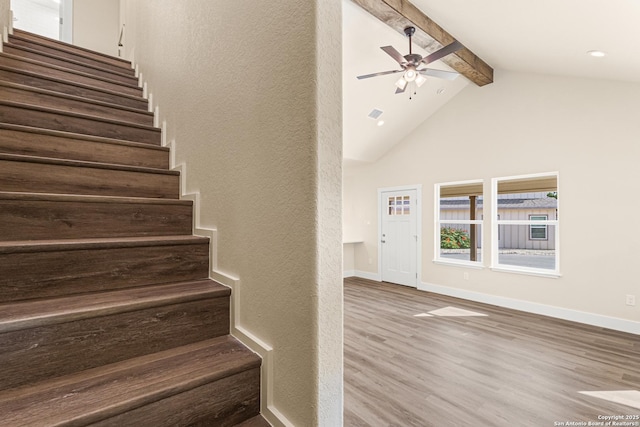 304 Riley Way, Kerrville, TX 78028 - stairs featuring beamed ceiling, a ceiling fan, wood finished floors, high vaulted ceiling, and a textured wall