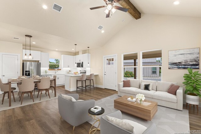 304 Riley Way, Kerrville, TX 78028 - living room with beam ceiling, wood finished floors, ceiling fan, recessed lighting, and high vaulted ceiling