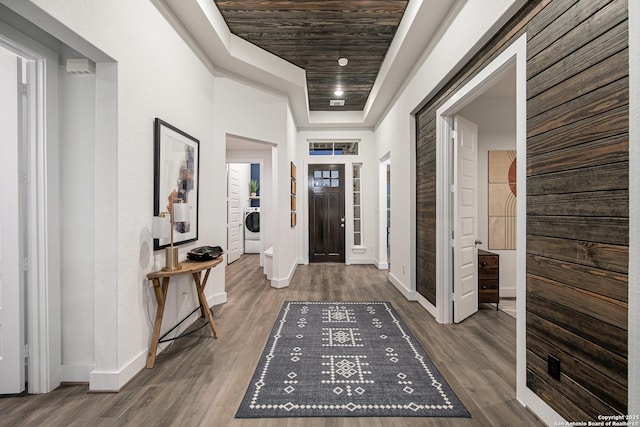 270 Lily Pass, Castroville, TX 78009 - entryway with wood finished floors and washer / dryer