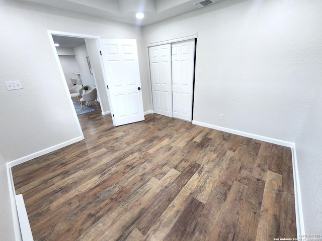 102 Wonder, San Antonio, TX 78213 - unfurnished bedroom featuring wood finished floors and a closet