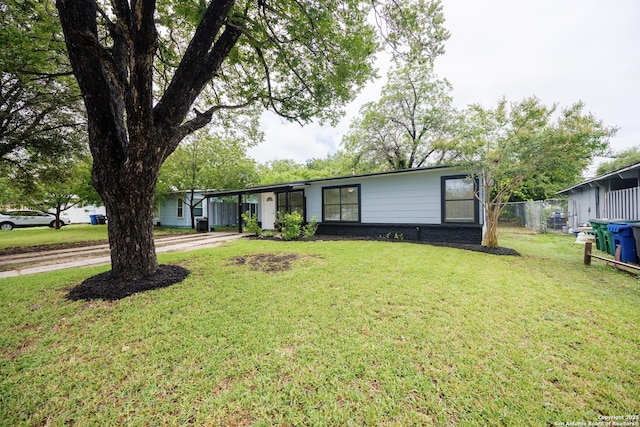251 Serna, San Antonio, TX 78218 - ranch-style home featuring concrete driveway and an attached carport