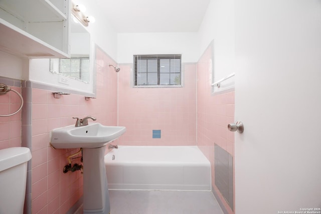 251 Serna, San Antonio, TX 78218 - full bathroom featuring tile walls and bathtub / shower combination