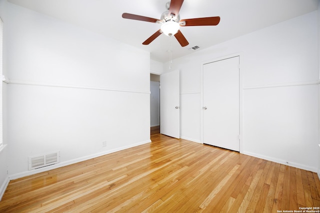 251 Serna, San Antonio, TX 78218 - unfurnished bedroom featuring hardwood / wood-style flooring and a ceiling fan