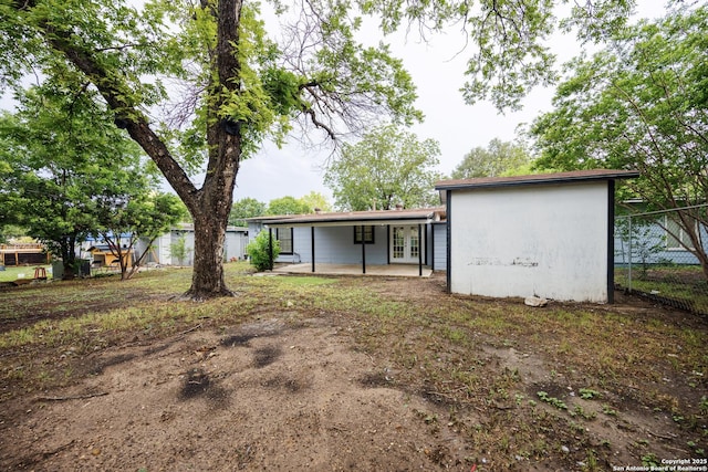 251 Serna, San Antonio, TX 78218 - rear view of property featuring french doors and a patio