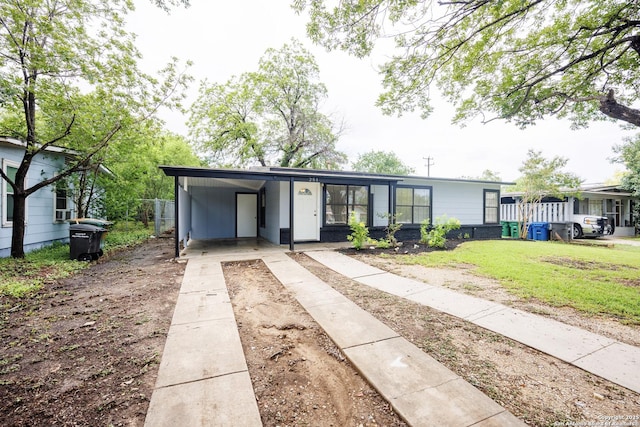 251 Serna, San Antonio, TX 78218 - view of front of property featuring driveway and an attached carport