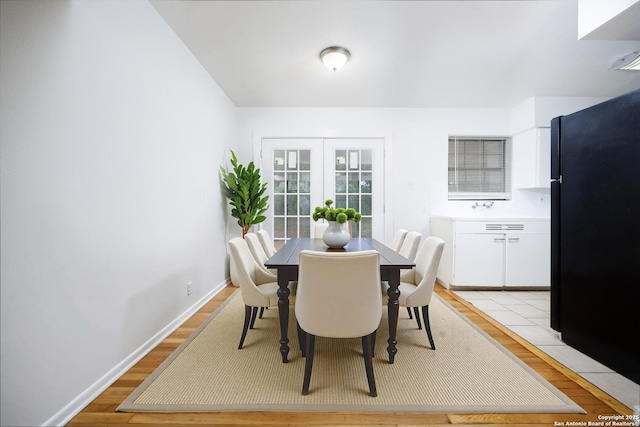 251 Serna, San Antonio, TX 78218 - dining room featuring light wood-type flooring and french doors