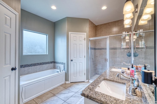 104 Sunday Ct, Uvalde, TX 78801 - full bathroom with vanity, a bath, tile patterned flooring, a stall shower, and recessed lighting