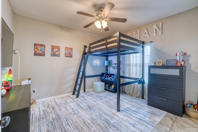 104 Sunday Ct, Uvalde, TX 78801 - bedroom with a ceiling fan and baseboards