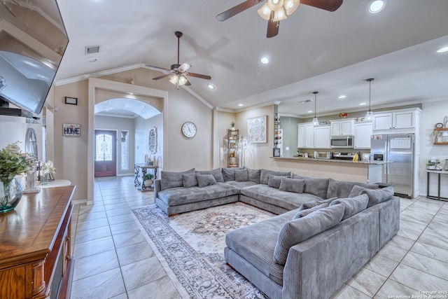 104 Sunday Ct, Uvalde, TX 78801 - living area featuring a ceiling fan, arched walkways, crown molding, recessed lighting, and light tile patterned flooring