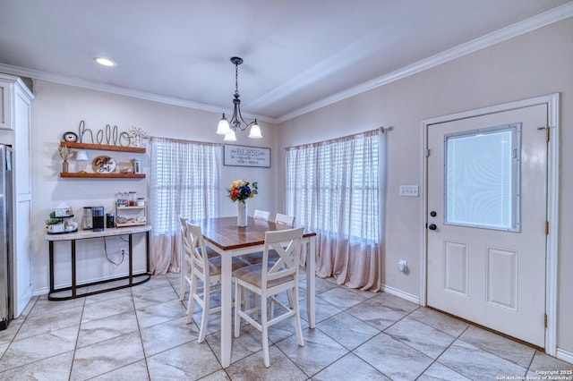 104 Sunday Ct, Uvalde, TX 78801 - dining area featuring ornamental molding, a chandelier, and light tile patterned flooring