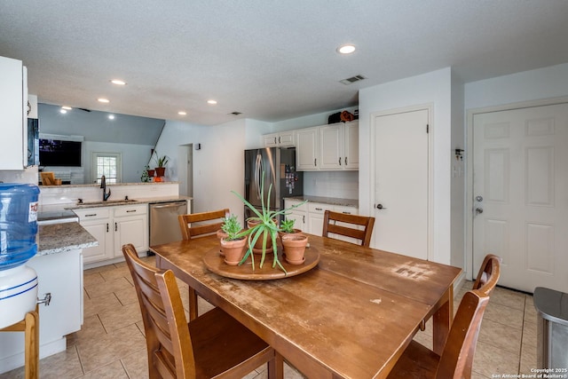 2500 Newning, Schertz, TX 78154 - dining area with light tile patterned flooring and recessed lighting