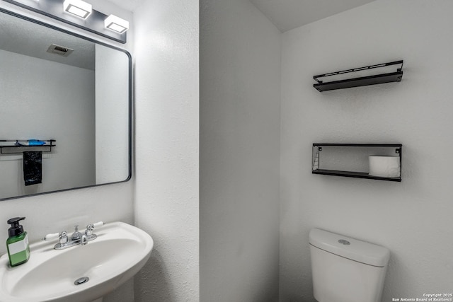 2500 Newning, Schertz, TX 78154 - bathroom with a sink and toilet