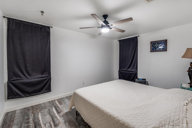 2500 Newning, Schertz, TX 78154 - bedroom featuring wood finished floors and ceiling fan