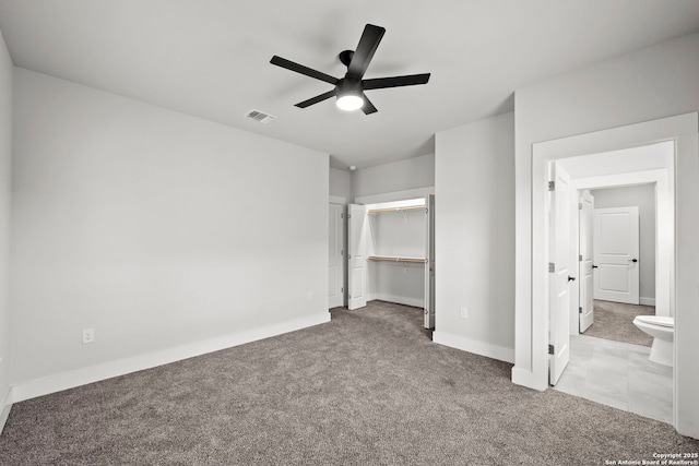 10706 Pharaoh Run, San Antonio, TX 78254 - unfurnished bedroom featuring carpet floors, a ceiling fan, a walk in closet, and a closet